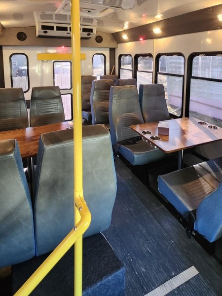 The inside of a wine shuttle bus